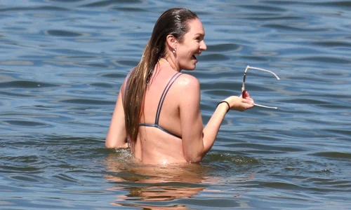 *EXCLUSIVE* Candice Swaneopel looks like she's ready to pop as she enjoys a day at the beach **WEB MUST CALL FOR PRICING** jpeg
