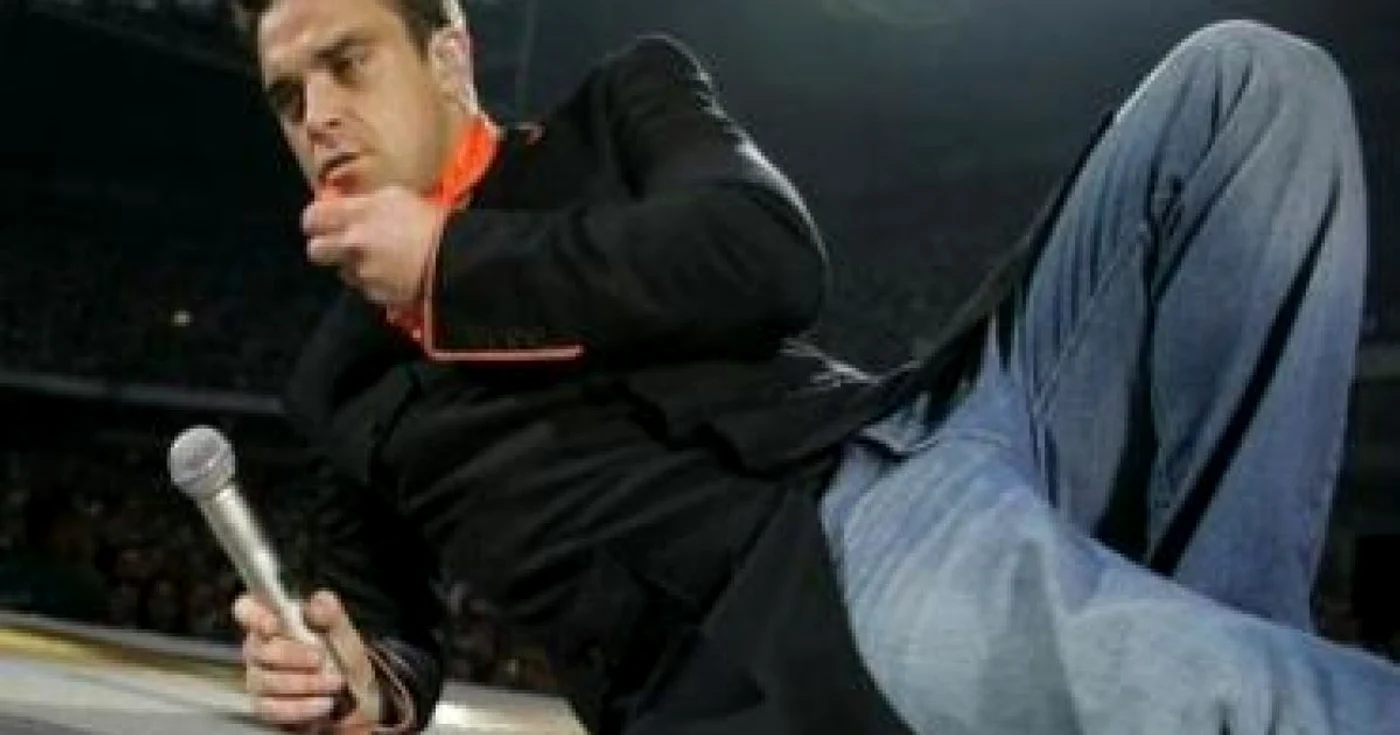 Robbie Williams a revenit alături de membrii formaţiei "Take That"
