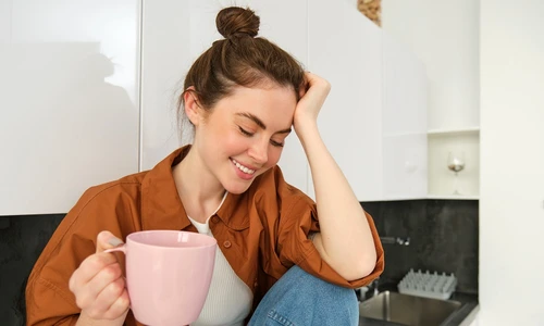 portrait beautiful young woman enjoying her morning cup aromatic coffee drinking tea while jpg