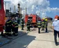 Imagini cu pompierii care au stins incendiul de la Petromidia foto isu