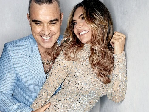 1 22446624 7806571 robbie wears suit dashing tweeds ayda wears dress narces shot at a 2 1577575570173 jpg jpeg
