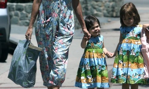 *EXCLUSIVE* Eva Mendes shows off her Summer fashion style while grabbing groceries with her daughters jpeg