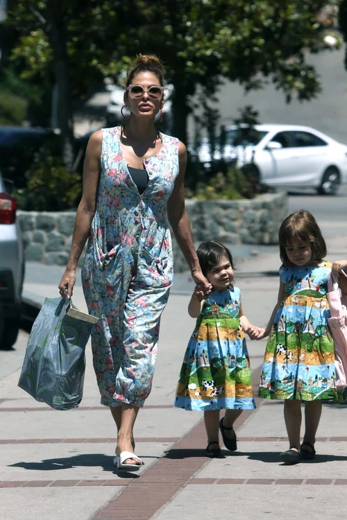 *EXCLUSIVE* Eva Mendes shows off her Summer fashion style while grabbing groceries with her daughters jpeg
