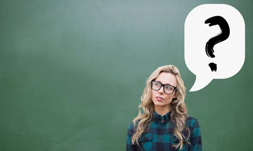 thoughtful young woman with question mark jpg