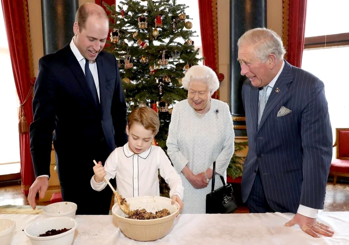 Regina Elisabeta alături de prinţii Charles, William şi George. Foto: Profimedia