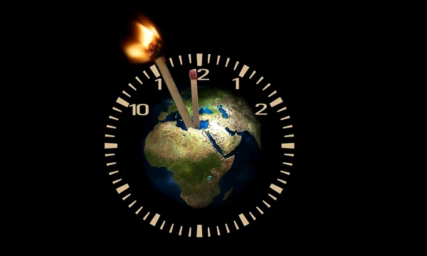 Globul pământesc în centrul unui ceas cu chibrituri drept pendule, unul dintre el fiind aprins   pixabay jpg