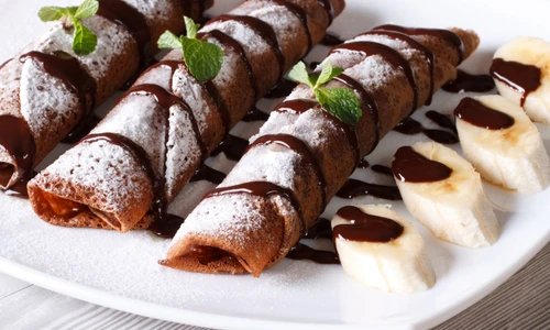 chocolate crepes with fruit and sauce close up  Horizontal jpeg