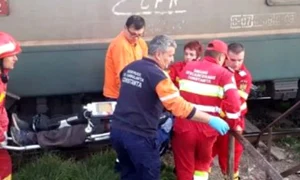 femeie lovita tren jpeg