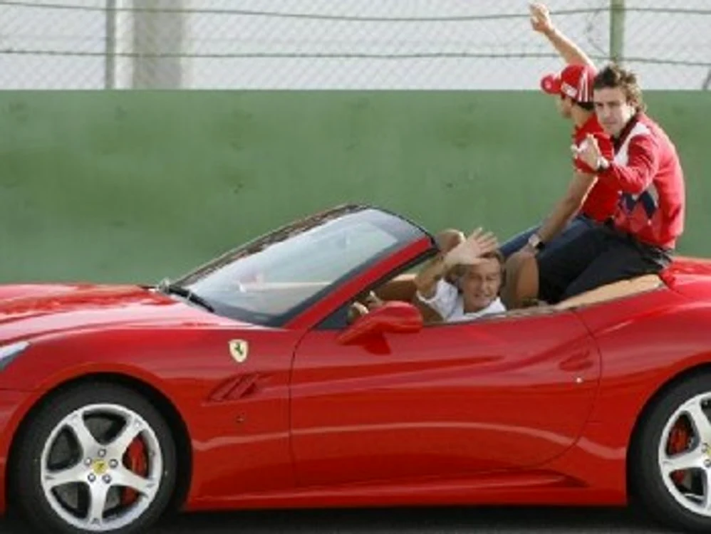 
    Fernando Alonso şi Felipe Massa  