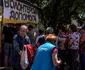 Razboi Ucraina Rusia 16 17 mai 2022 masa mancare ajutoare localnici Irpin FOTO EPA-EFE