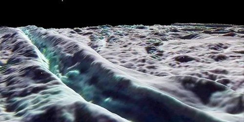 Una din lunile planetei Saturn, este acoperită de o pudră foarte fină, asemănătoare cu zăpada (Foto: National Geographic)