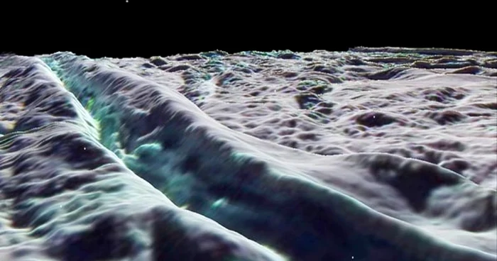 Una din lunile planetei Saturn, este acoperită de o pudră foarte fină, asemănătoare cu zăpada (Foto: National Geographic)