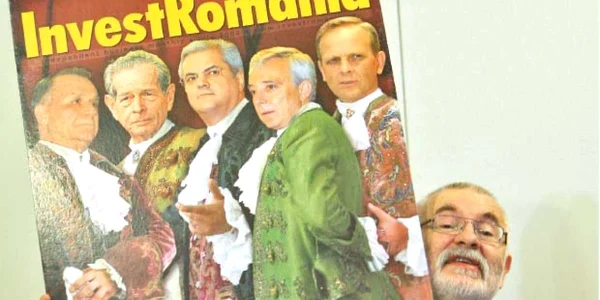 Bogdan Popovici prezintă unul  dintre afişele tipărite de firma  „Eurografica“ şi pentru care susţine că a cheltuit un milion de euro.