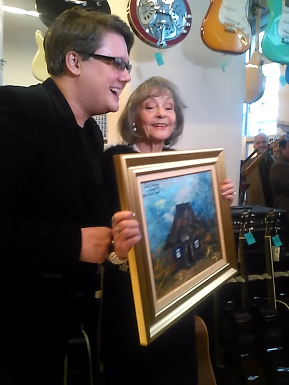 Marina Voica alături de Fuego, la una dintre expozițiile de pictură ale artistului