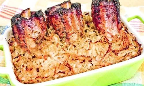 costite de porc cu varza acra la cuptor 580x400 jpeg