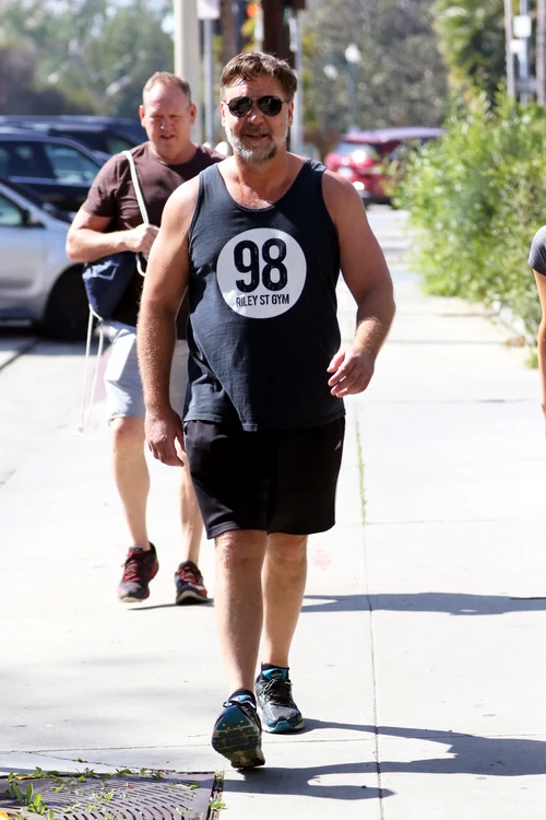 Russell Crowe goes for a run with a mystery blonde around Beverly Hills jpeg