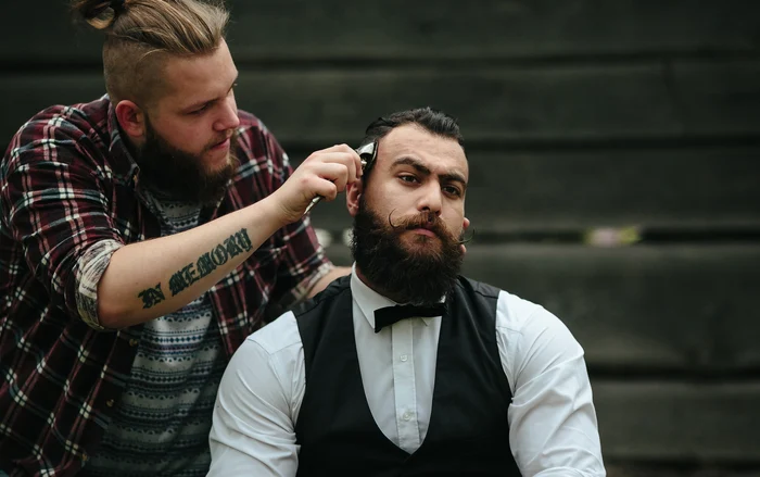 Prețurile tunsorilor au crescut în ultimii ani. Foto: Freepik.com