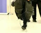 Rihanna arrives at JFK in oversized coat for a flight back to London jpeg
