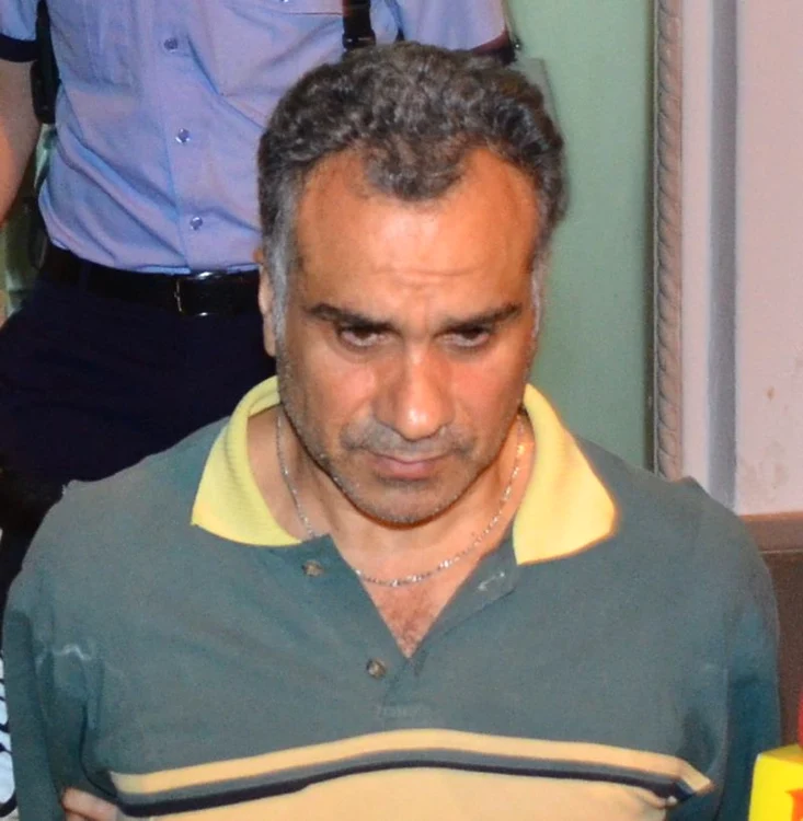 Kanan Ali, libanezul de 46 de ani care a înjunghiat-o pe fiica lui Adrian Enache, părea distrus în momentul în care a fost ridicat de poliţiştiFoto: Alex Muscaliu