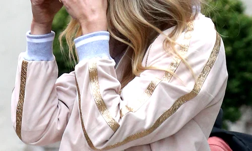 Gwyneth Paltrow covers her face while leaving her home in New York City jpeg
