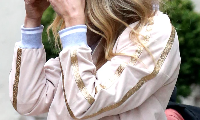 Gwyneth Paltrow covers her face while leaving her home in New York City jpeg
