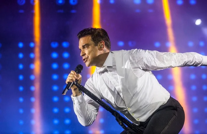 Concertul lui Robbie
Williams va avea loc pe data de 17 iulie, în Piaţa Constituţiei,
şi face parte din turneul internaţional „Let me Entertain You“
FOTO AP