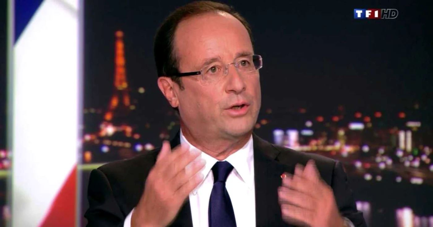 Liderul francez, François Hollande, în timpul interviului televizat de la postul TV TF1, în cadrul căruia şi-a anunţat planul drastic de redresare economică a ţării FOTO: Reuters