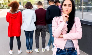 portrait thoughtful woman standing street jpg