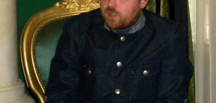 Adrian G Romila