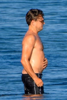 Leonardo Dicaprio appears self conscious when spotted shirtless in Malibu jpeg