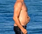 Leonardo Dicaprio appears self conscious when spotted shirtless in Malibu jpeg