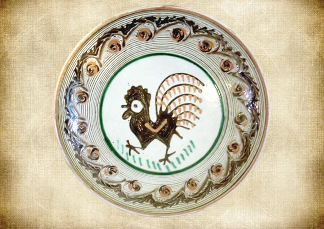 Farfurie decorativă din lut, pictată manual, la www.cadouri-artizanat.ro
