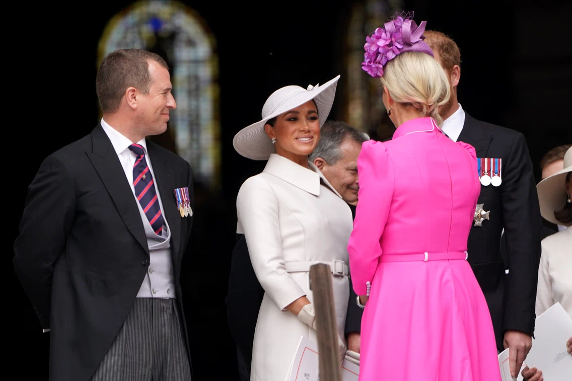Peter Philips, Zara Tindall și Meghan Markle. FOTO: Getty Images