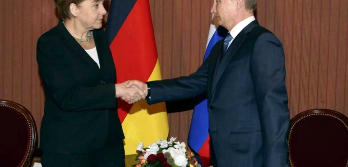 Angela Merkel, cancelarul Germaniei, şi Vladimir Putin, preşedintele Rusiei