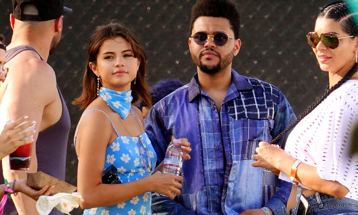 Selena Gomez makes out with The Weeknd as they shared in sights of the Coachella Festival in Indio, CA jpeg