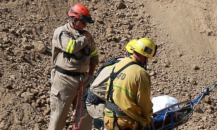 *EXCLUSIVE* The body of a construction worker is taken away after an accident behind Jennifer Aniston's house jpeg