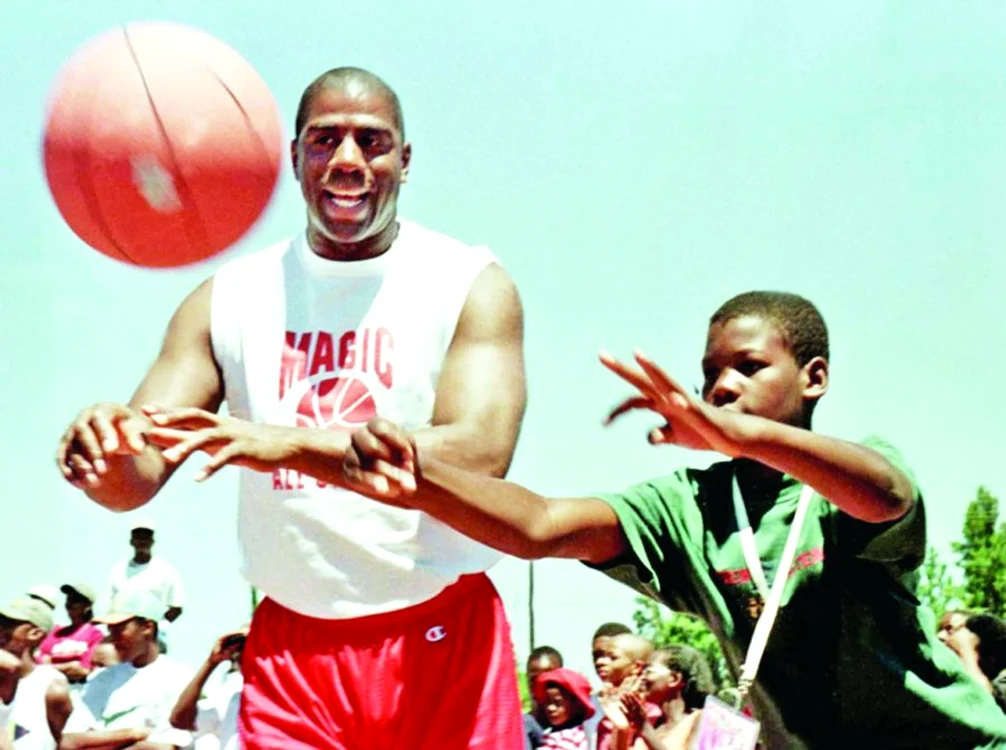 
    Magic Johnson a  devenit proprietar  de echipă de baseball  