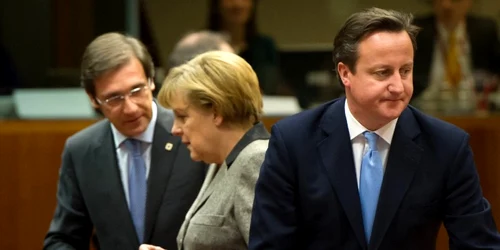 David Cameron si Angela Merkel AFP