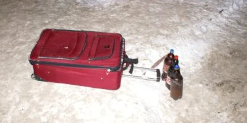 În valiza uitată lângă gară au fost găsite trei sticle cu vin 