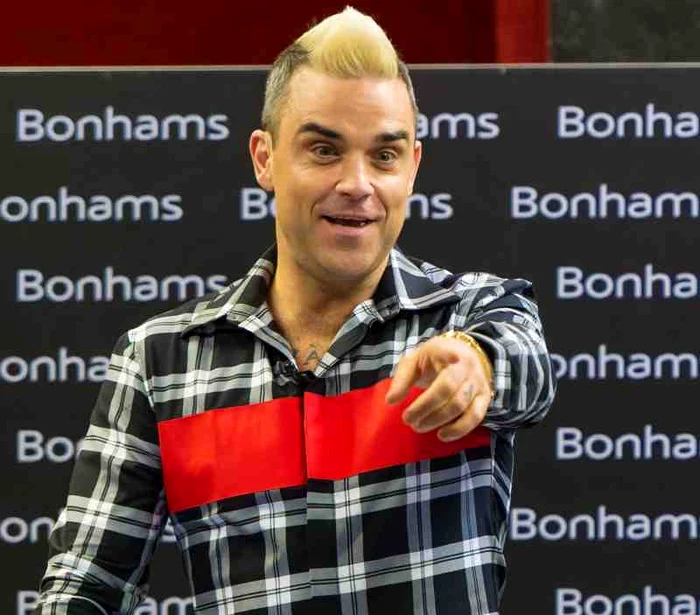 
    Mai sunt câteva ore până la concertul lui Robbie Williams la BucureștiFoto: Getty  