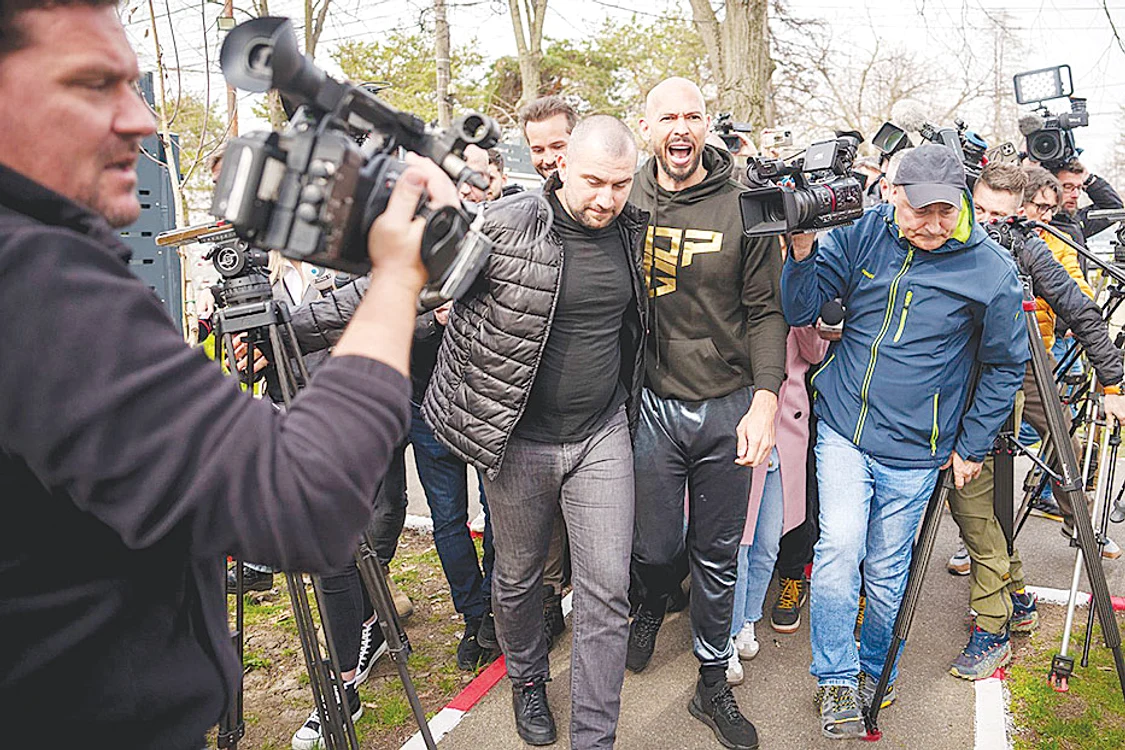 Fraţii Tate  se bucură din plin  de atenţia pe care  le-o acordă presa. FOTO: Profimedia