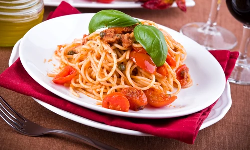 13831484   spaghetti with tuna, cherry tomatoes and capers  jpeg