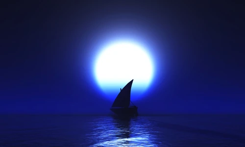 sailboat illuminated by moon jpg