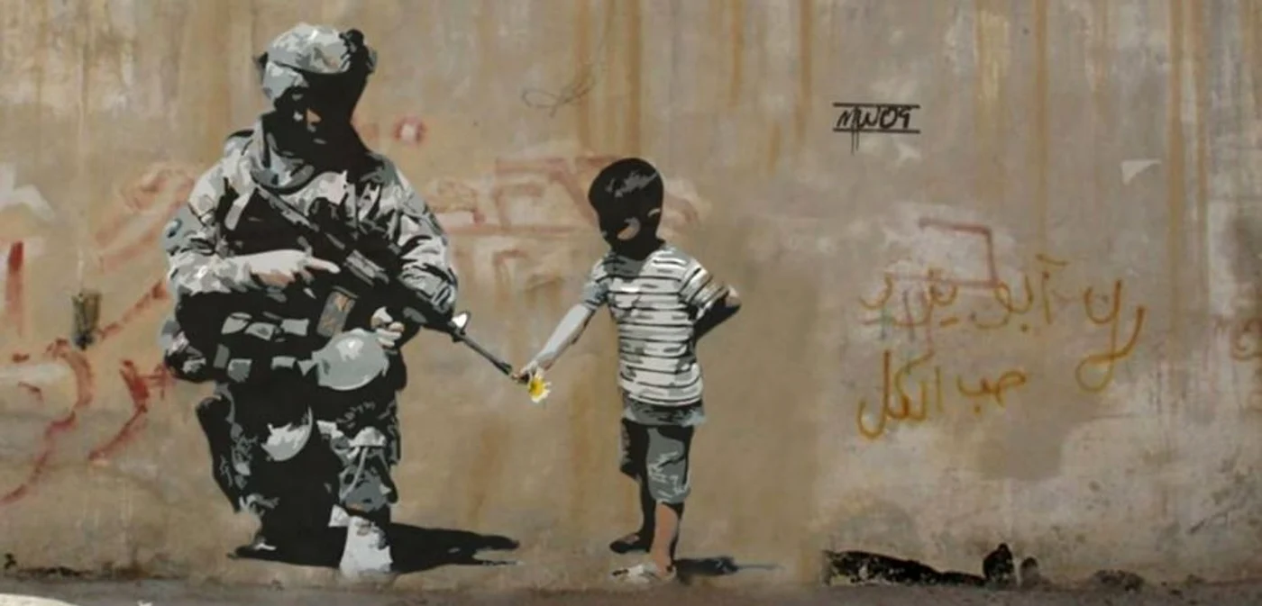 Foto: Bansky, pictură murală stradală