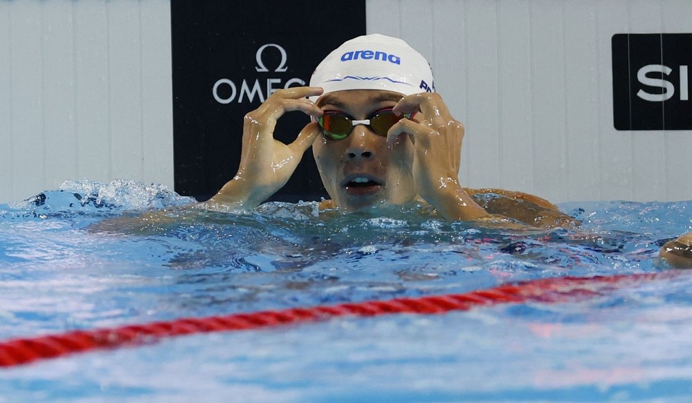 David Popovici înotând în piscina de la Campionatul European natație, proba 100 metri liber, în timpul seriilor de calificare. | sursa foto: Click