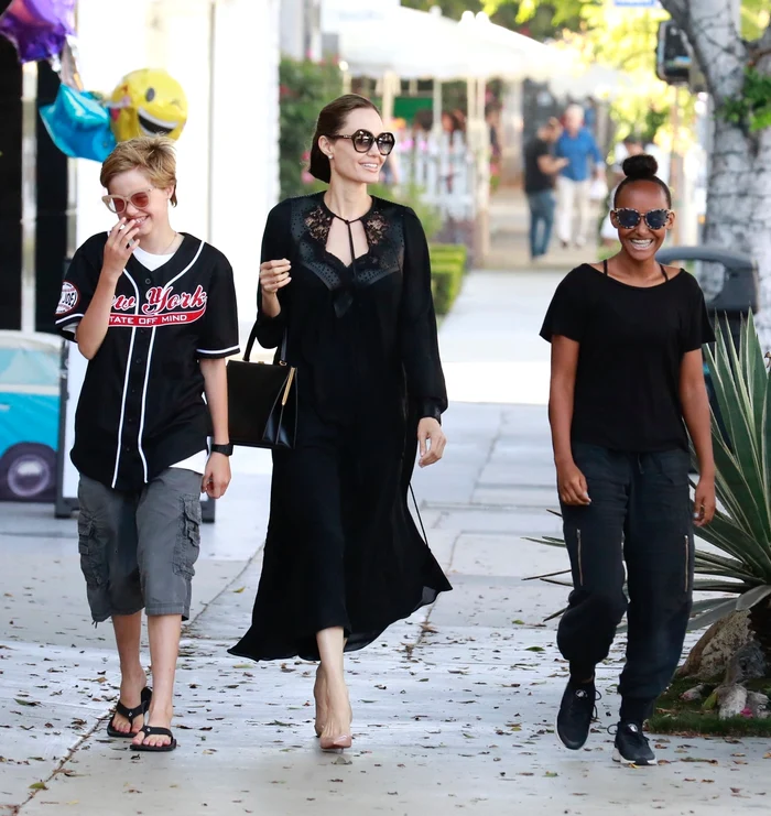 Angelina Jolie takes the girls for some retail therapy at Kitson jpeg