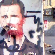 Portretele preşedintelui sirian Bashar al Assad, distruse