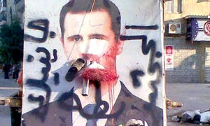 Portretele preşedintelui sirian Bashar al Assad, distruse