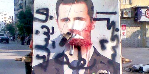 Portretele preşedintelui sirian Bashar al Assad, distruse