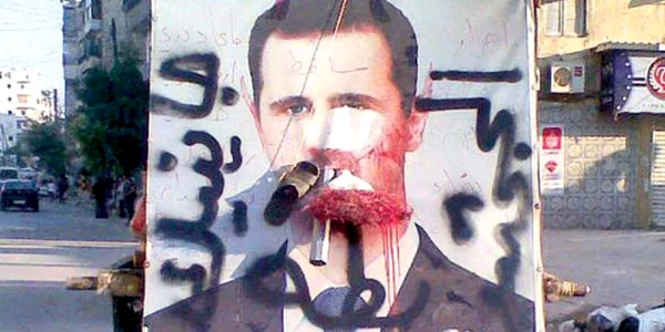 Portretele preşedintelui sirian Bashar al Assad, distruse
